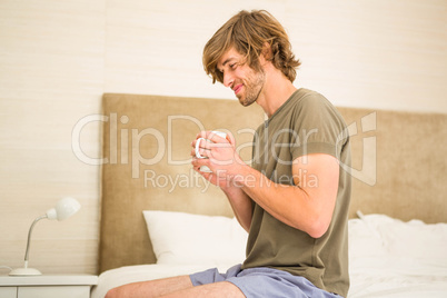 Handsome man drinking coffee