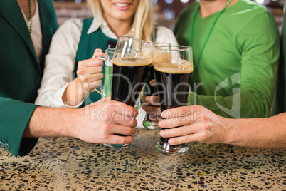 Friends toasting with beers