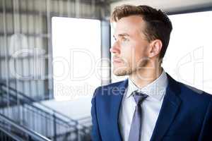 Businessman looking away in office