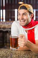 Man toasting a beer