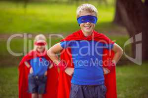 Brother and sister pretending to be superhero