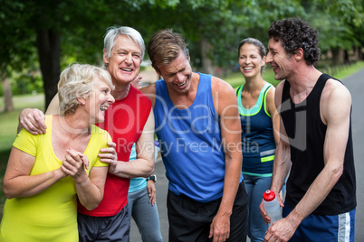 Marathon athletes posing and laughing