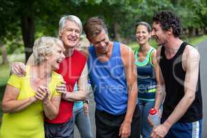 Marathon athletes posing and laughing