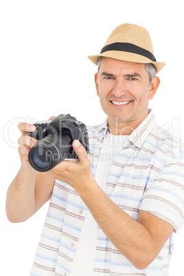 Handsome man taking picture