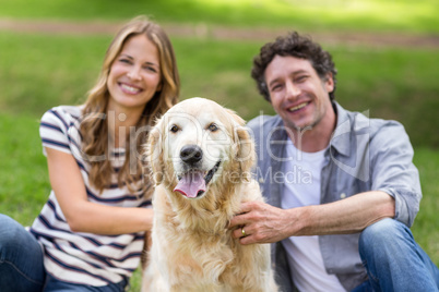 Couple with their dog in the park