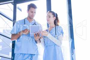 Medical team interacting using digital
