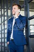 Businessman talking on smartphone