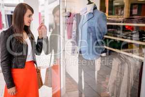 Beautiful woman window shopping