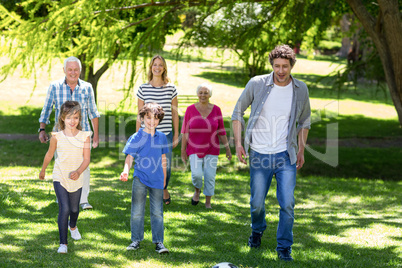 Smiling family walking