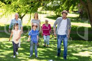 Smiling family walking