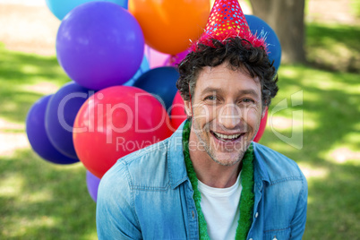 Smiling father at birthday party