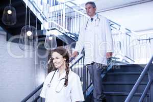 Doctors walking down stairs