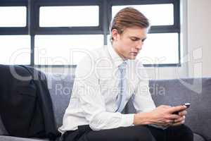 Businessman using mobile phone