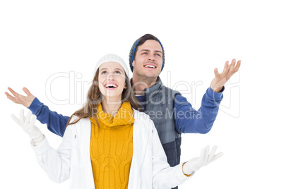 Happy couple feeling the snow