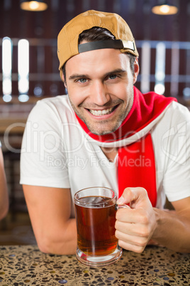 Man toasting a beer