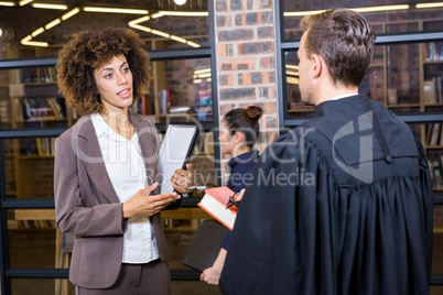 Lawyer interacting with businesswoman