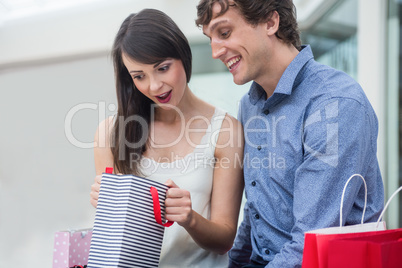 Couple looking in the shopping bag