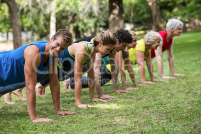 Fitness class practicing yoga