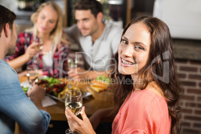 Couples drinking white wine