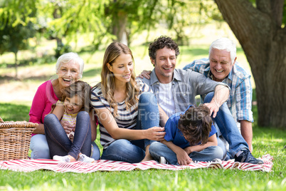 Smiling family having a picnic