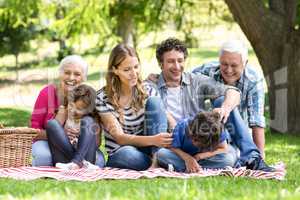 Smiling family having a picnic