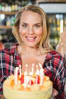 Woman holding cake