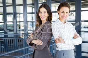 Businesswomen standing with her colleague