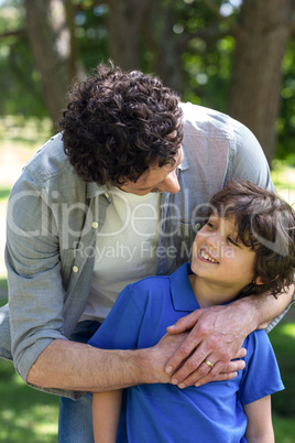 Father and son standing