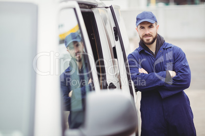 Repairman with arms crossed