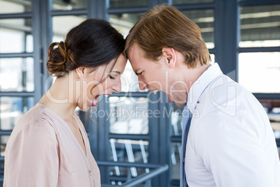 Two young business colleagues having an argument