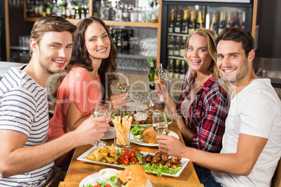 Friends drinking white wine