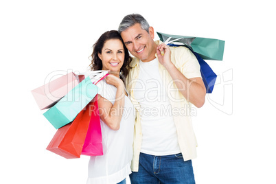 Attractive couple holding shopping bags Attractive couple holding shopping bags