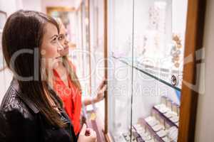 Two beautiful women in a jeweler shop