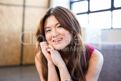 Businesswoman looking at camera and smiling