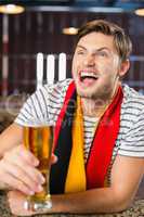 Man toasting a beer