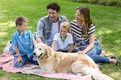 Family with dog in the park