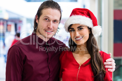 Portrait of a couple in Christmas attire