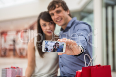 Happy couple taking a selfie