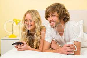 Cute couple watching TV