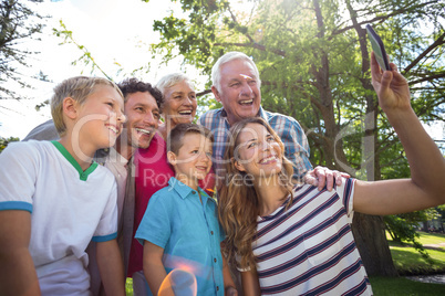 Smiling family taking selfie