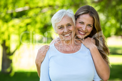 Family standing and smiling