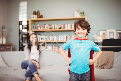 Portrait of smiling boy wearing superhero costume
