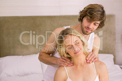 Boyfriend giving a massage to his girlfriend