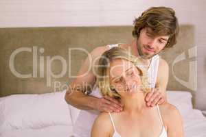 Boyfriend giving a massage to his girlfriend