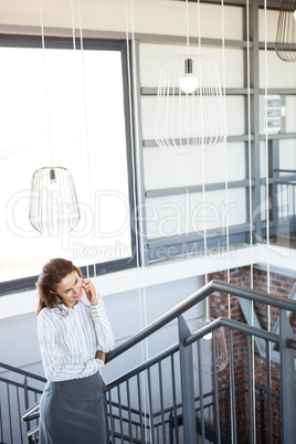 Businesswoman talking on smartphone