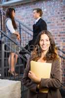 Confident businesswoman smiling at camera