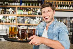 Man serving beers