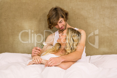 Cute Couple Cuddling In Bed Lizenzfreie Bilder Und Fotos