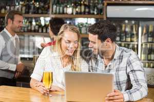 Couple looking at a laptop