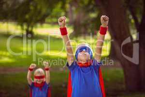 Brother and sister pretending to be superhero